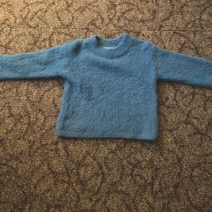 A sweater from H&M. Perfect for winter. Super soft and cozy, very durable.